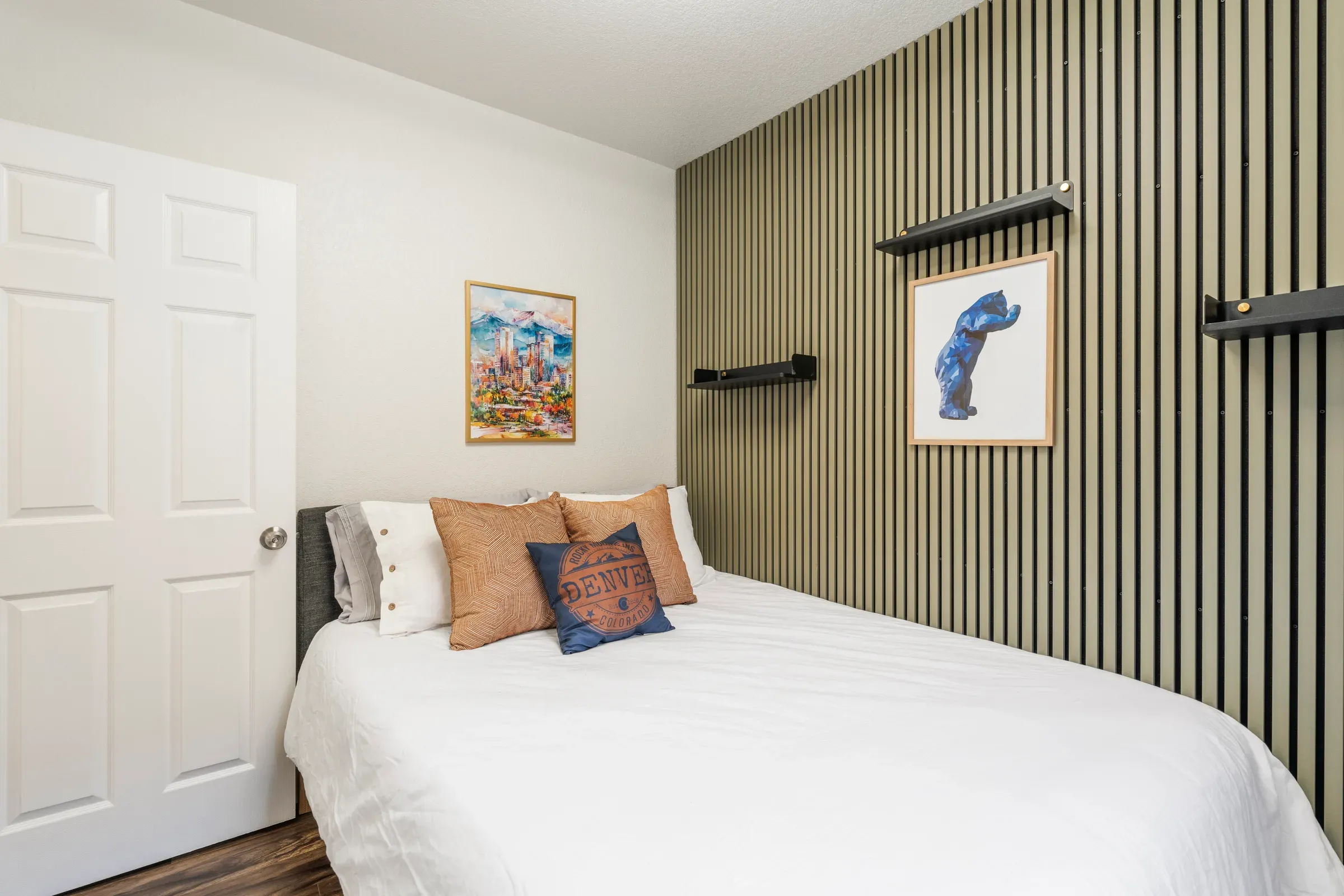Cozy Denver-themed bedroom in a Stay Awhile rental